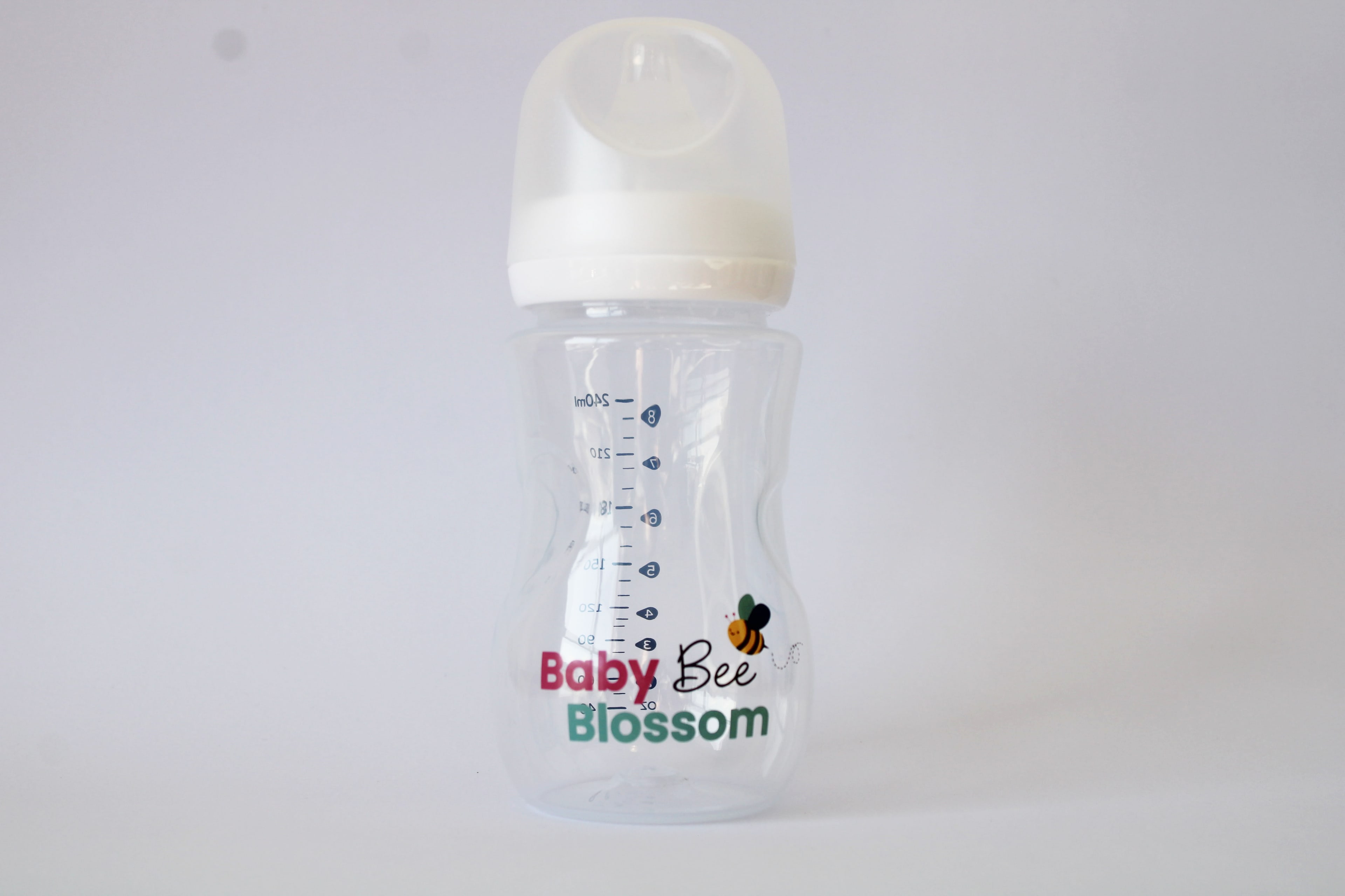 Baby Bee Blossom 240 ml feeding bottle with cap fitted